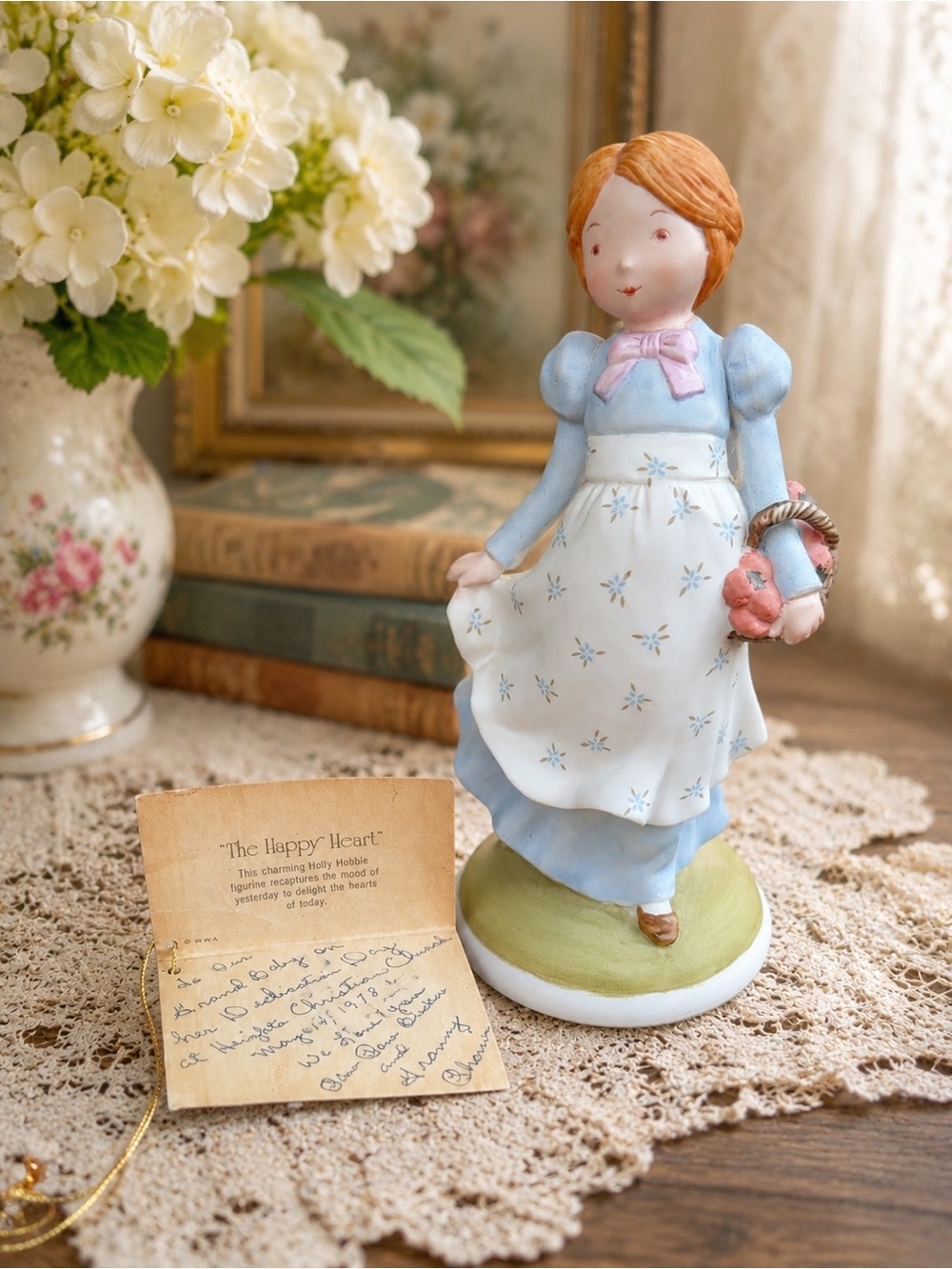 Vintage-Style Blue & White Girl Figurine with Pink Bow